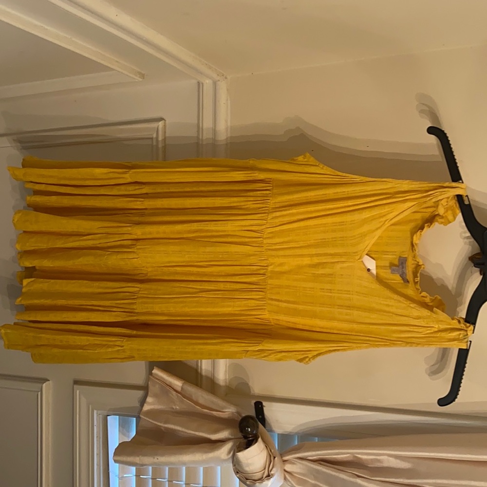 Yellow flair dress.